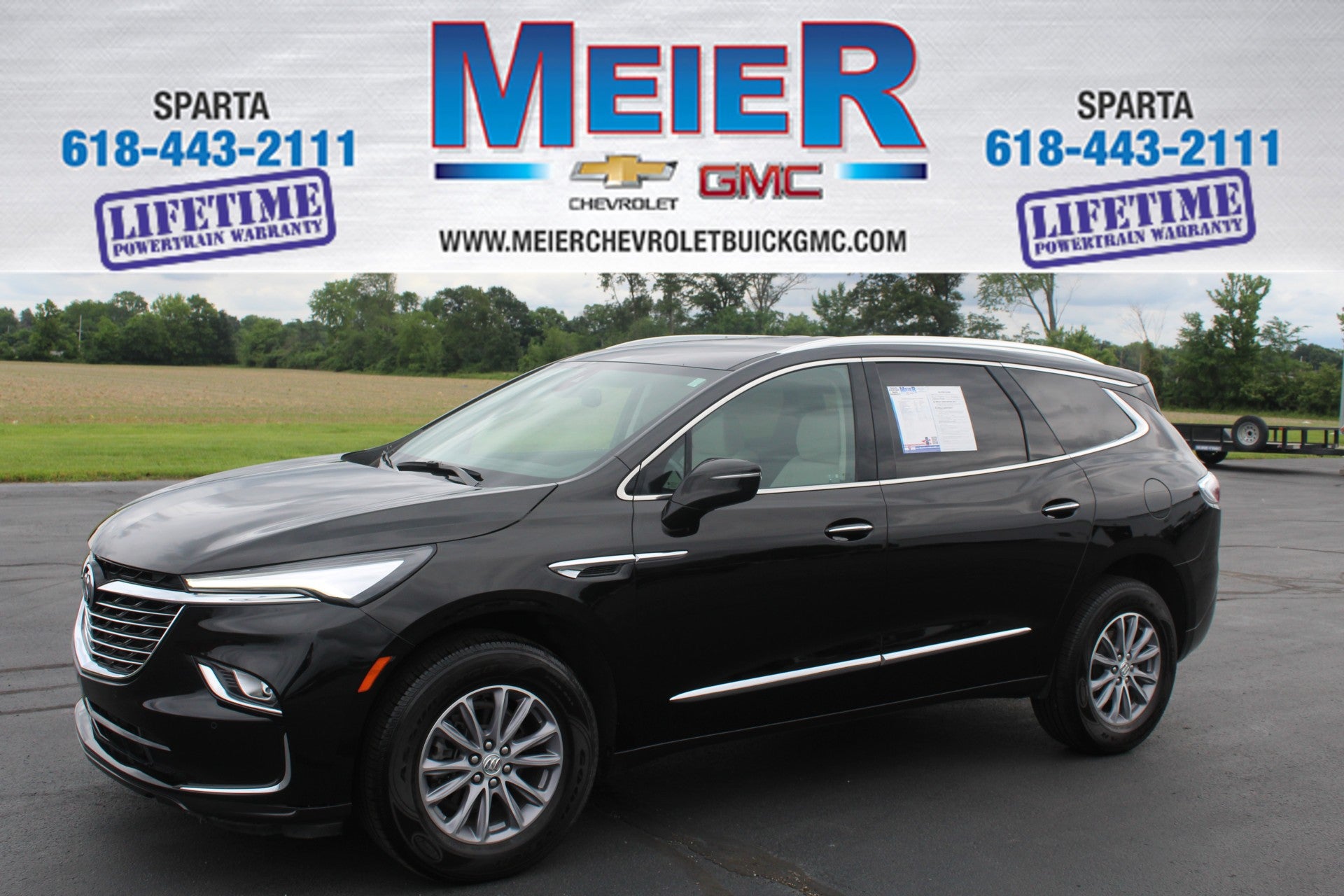 2024 Buick Enclave Essence in Ebony Twilight Metallic — front three-quarter view