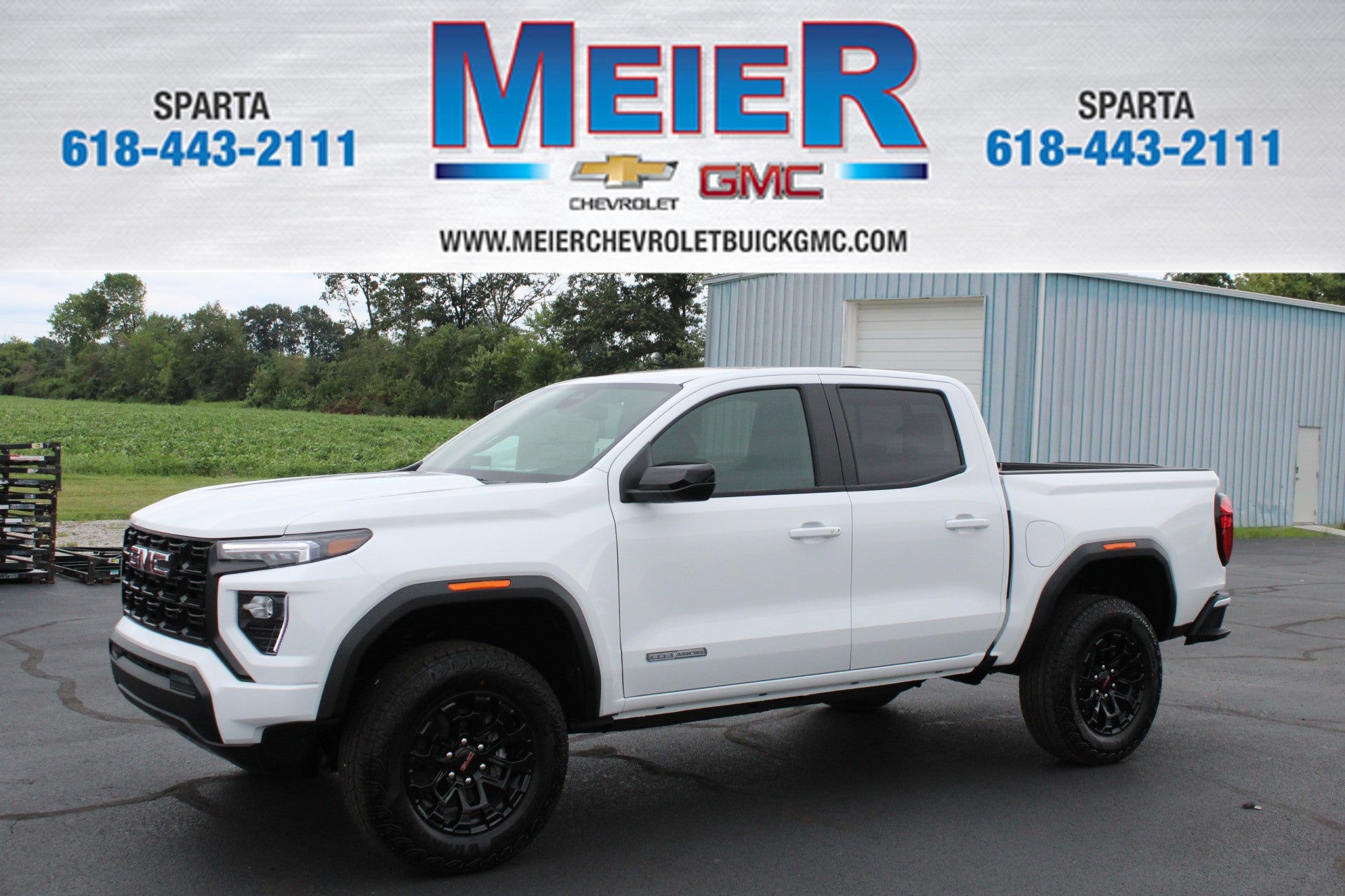 2026 GMC Canyon Elevation in Summit White — front three-quarter view