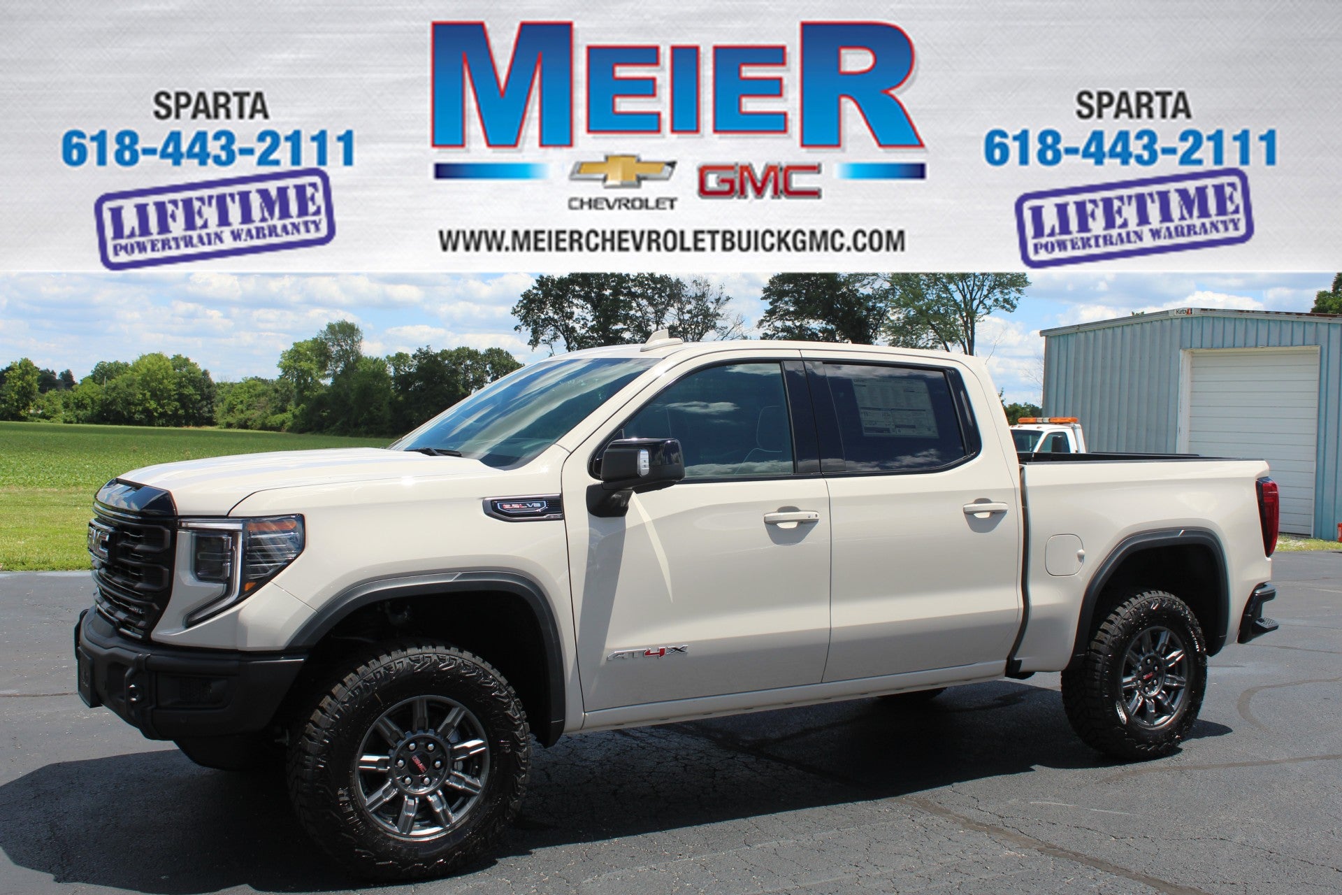 2026 GMC Sierra 1500 AT4X in Coastal Dune — front three-quarter view